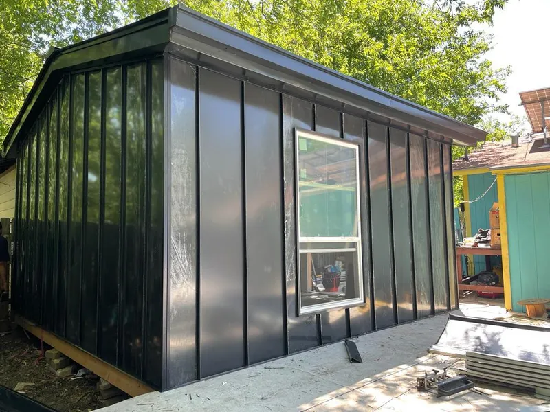 Black standing seam metal wall panels for Roof Inspection in Wellsville