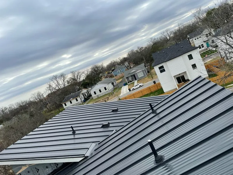 Standing seam metal roof panels with vents for Skylight Repair in Wellsville